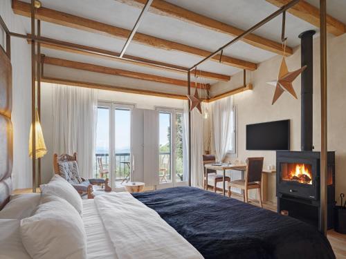 Postel nebo postele na pokoji v ubytování Mazaraki Guesthouse