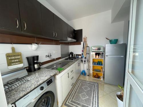 Kuchyň nebo kuchyňský kout v ubytování Moderne appartement