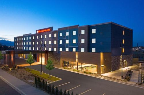 a building with a sign on top of it at Hilton Garden Inn Longmont in Longmont
