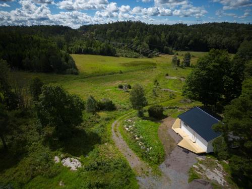 an overhead view of a small building in a field at Wild Lodge in Nol