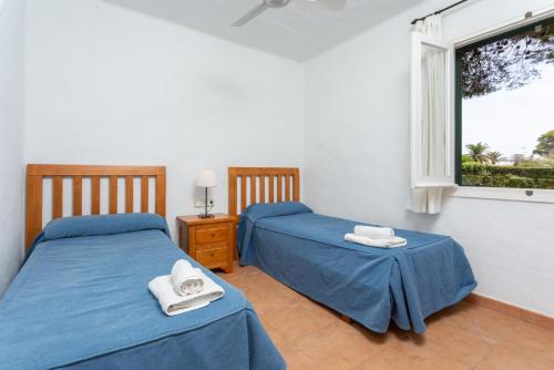 Postel nebo postele na pokoji v ubytování Villa Binimary