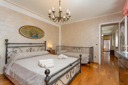 Säng eller sängar i ett rum på Villa Casale Le Selve