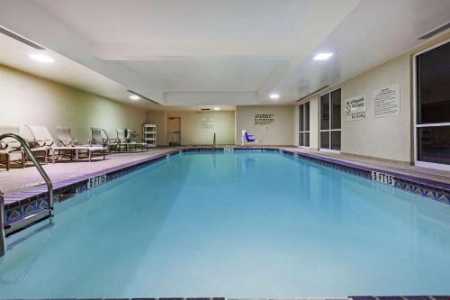 a large swimming pool in a hotel room at Hampton Inn & Suites El Paso West in El Paso