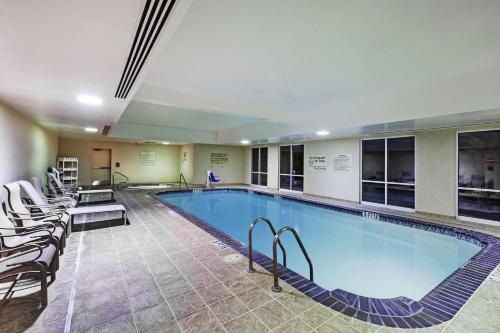 a large swimming pool in a hotel room at Hampton Inn & Suites El Paso West in El Paso