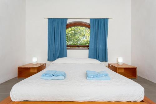 Katil atau katil-katil dalam bilik di Villa Caporlese