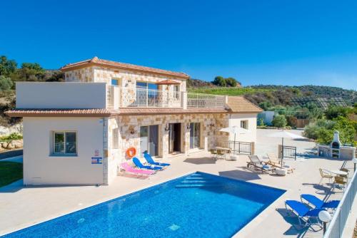 an image of a villa with a swimming pool at Villa Christel in Lachi