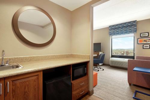 a bathroom with a sink and a mirror in a room at Hampton Inn & Suites Ephrata - Mountain Springs in Ephrata