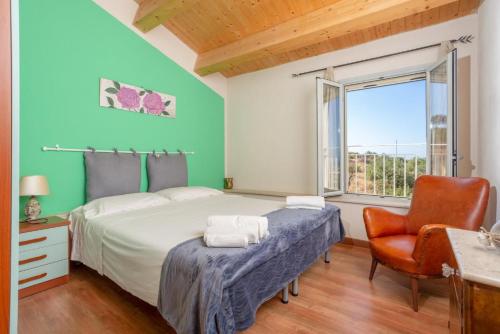 Postel nebo postele na pokoji v ubytování Villa La Mia Sicilia