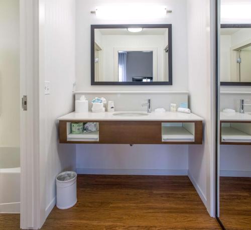 a bathroom with a sink and a mirror at Hampton Inn & Suites Whitefish in Whitefish