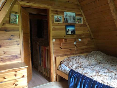 Krevet ili kreveti u jedinici u okviru objekta Domek w Lesie