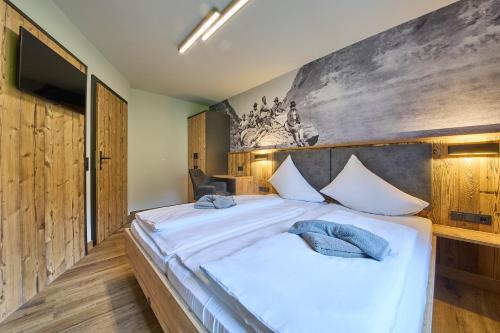 Eibinghof BED & BREAKFAST & SWIMにあるベッド