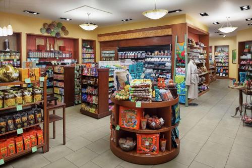 a grocery store aisle with products on display at Hilton Grand Vacations Club Grand Waikikian Honolulu in Honolulu