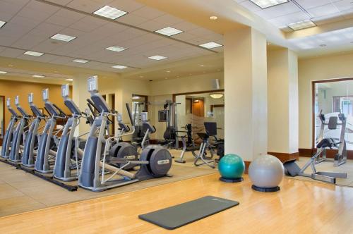 a gym with treadmills and exercise equipment in a building at Hilton Grand Vacations Club Grand Waikikian Honolulu in Honolulu