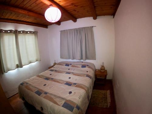 Posteľ alebo postele v izbe v ubytovaní Casa en playa de Llico, Vichuquén