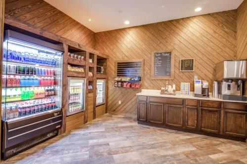 a grocery store with a refrigerator and a counter at DoubleTree by Hilton Huntington, WV in Huntington