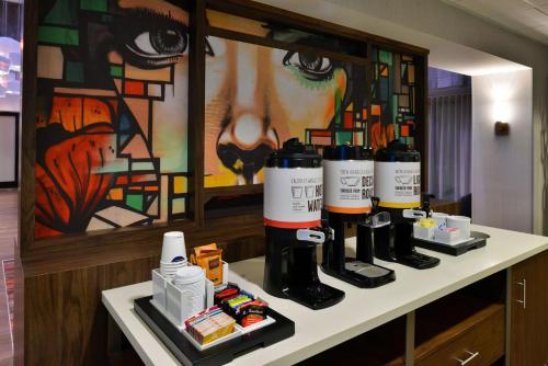a counter with a bunch of products on it at Hampton Inn & Suites Las Vegas Airport in Las Vegas