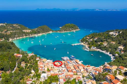 an aerial view of a harbor with boats in the water at Flora Maisonettes 2 in Gaios