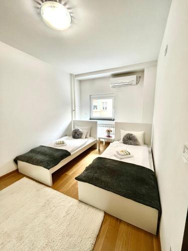 Ένα ή περισσότερα κρεβάτια σε δωμάτιο στο Apartment Delic
