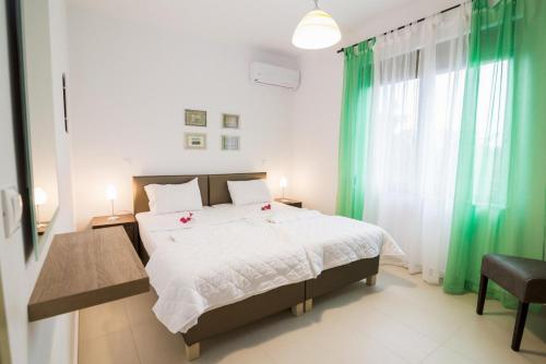 Katil atau katil-katil dalam bilik di Litsarda Villas Collection
