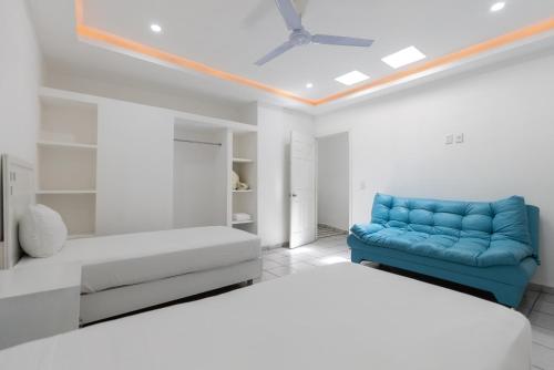 Postel nebo postele na pokoji v ubytování Loft Hotel Malecón Vallarta