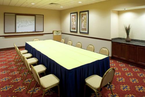 a conference room with a table and chairs at Homewood Suites Laredo at Mall Del Norte in Laredo