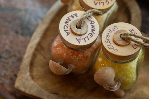 two jars of pickled vegetables with labels on them at AL RANCH WELLNESS CADORE DOLOMITI APARTMENTS vicino Cortina Olimpiadi 2026 e Misurina Tre Cime Lavaredo in Pieve di Cadore