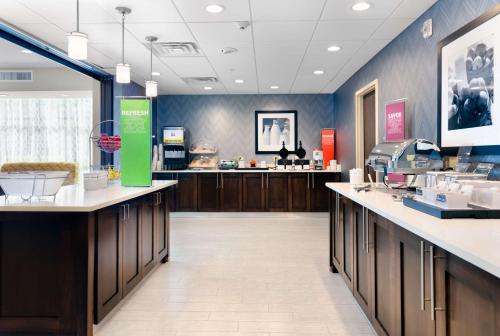 a store lobby with a cash counter and a cash register at Hampton Inn Wetumpka in Wetumpka