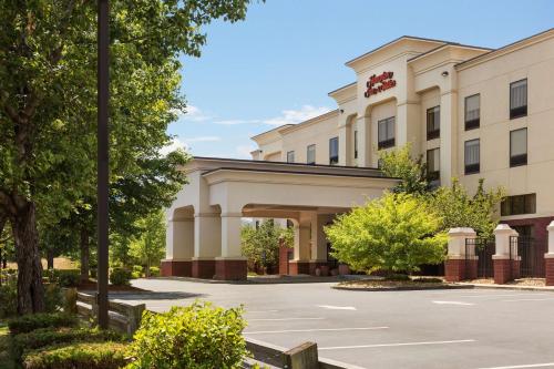 a rendering of the front of a hotel at Hampton Inn & Suites by Hilton Manchester Bedford in Bedford