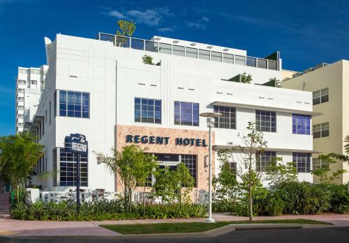 a white building with a resort hotel sign on it at Gale South Beach, Curio Collection By Hilton in Miami Beach