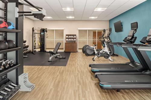 a fitness room with treadmills and cardio machines at Hampton Inn & Suites Miami, Kendall, Executive Airport in Kendall