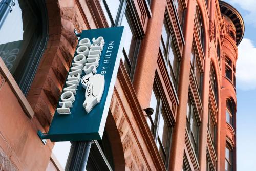 a sign on the side of a building at Homewood Suites By Hilton Milwaukee Downtown in Milwaukee