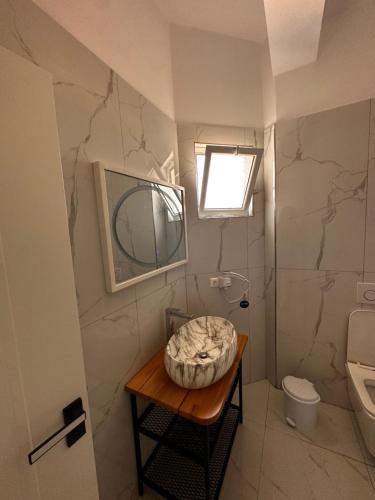 Ένα μπάνιο στο Hotel Belle Vue