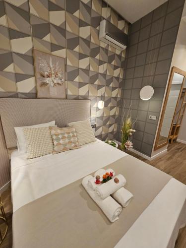 Ein Bett oder Betten in einem Zimmer der Unterkunft Lounge garden sea relax