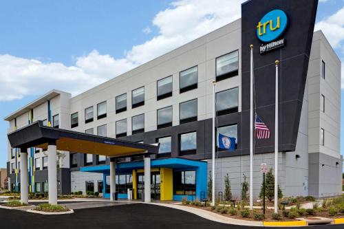 an office building with a ford gas station at Tru By Hilton Manassas, Va in Manassas