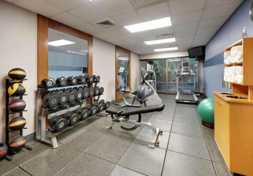 a room with a gym with a treadmill and weights at Hampton Inn & Suites Mooresville in Mooresville