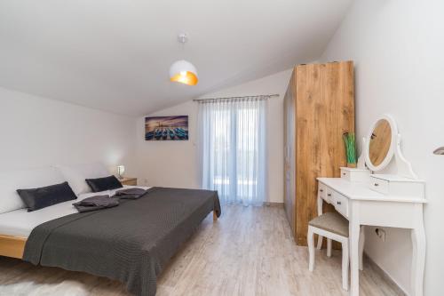 Postel nebo postele na pokoji v ubytování Vila Zara