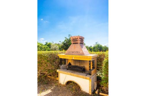 a beehive in the middle of a field at Villa Tsikkos Ena in Argaka