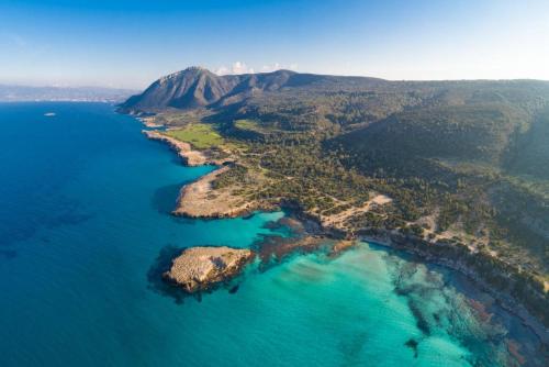 an aerial view of an island in the ocean at Villa Tsikkos Ena in Argaka