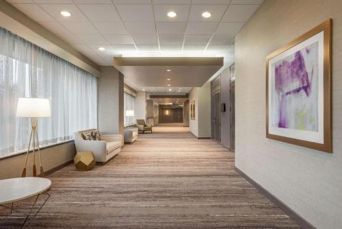 a hallway of a hospital with a waiting room at DoubleTree by Hilton St. Paul, MN in Saint Paul