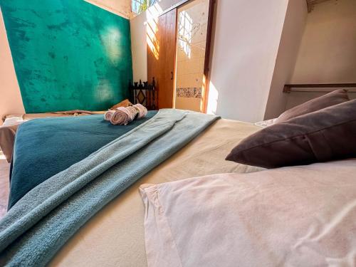 Кровать или кровати в номере Pousada Vale das Primaveras