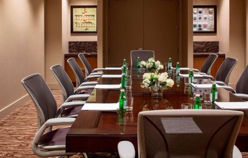 a conference room with a long table and chairs at Hilton Garden Inn Downtown Dallas in Dallas