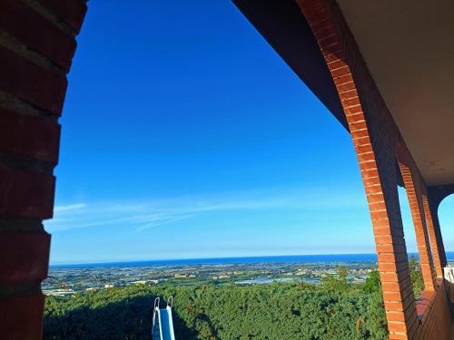 a view of the ocean from a building at Relais Galatea in Montecorvino Pugliano
