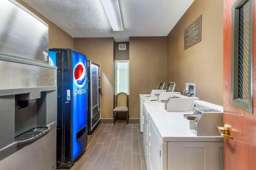 a waiting room with a pepsi machine at Comfort Inn & Suites Rapid City in Rapid City