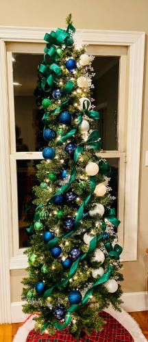 a christmas tree with blue and white ornaments at Mountain Shade in Townsend