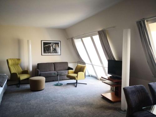 Un lugar para sentarse en First Inn Hotel Zwickau