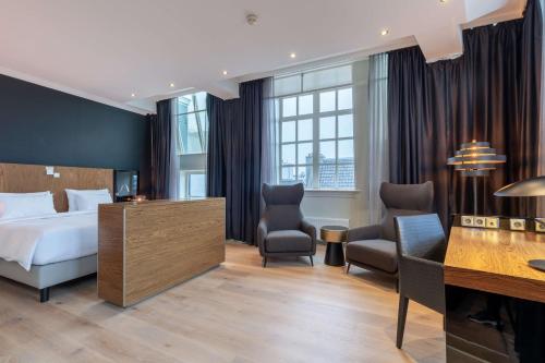 Ένα ή περισσότερα κρεβάτια σε δωμάτιο στο Radisson Blu Hotel, Amsterdam City Center