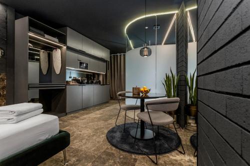 Katil atau katil-katil dalam bilik di Apartaestudios Evolution Luxury