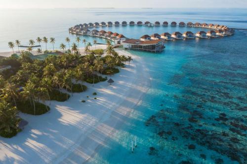 an aerial view of a resort in the ocean at Radisson Blu Resort Maldives in Fenfushi