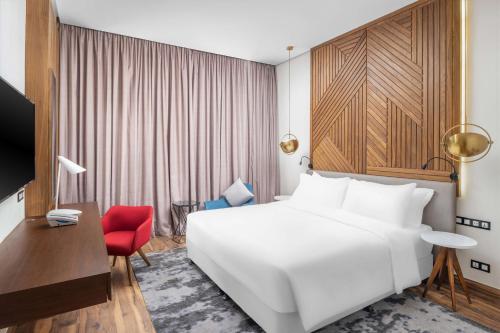 Postel nebo postele na pokoji v ubytování Radisson Blu Hotel Riyadh Qurtuba
