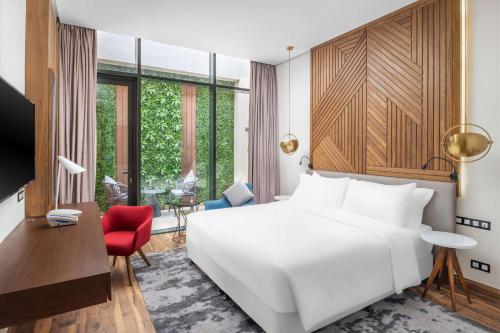 Postel nebo postele na pokoji v ubytování Radisson Blu Hotel Riyadh Qurtuba